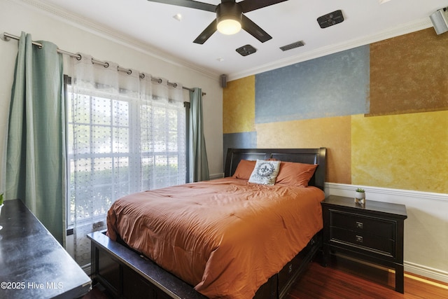 604 Lanvale Hills Cir, Leland, NC 28451 - bedroom with wood finished floors, visible vents, crown molding, and a ceiling fan