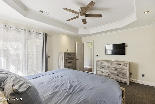 604 Lanvale Hills Cir, Leland, NC 28451 - bedroom with crown molding, ceiling fan, a raised ceiling, baseboards, and visible vents