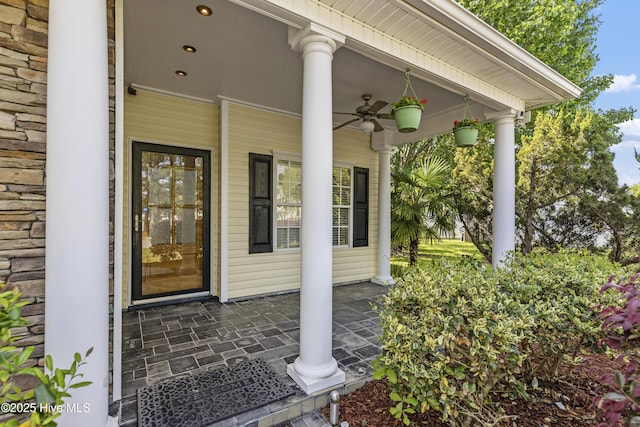 604 Lanvale Hills Cir, Leland, NC 28451 - property entrance featuring stone siding and a ceiling fan