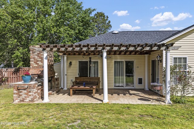 604 Lanvale Hills Cir, Leland, NC 28451 - back of house featuring a pergola, a lawn, and fence