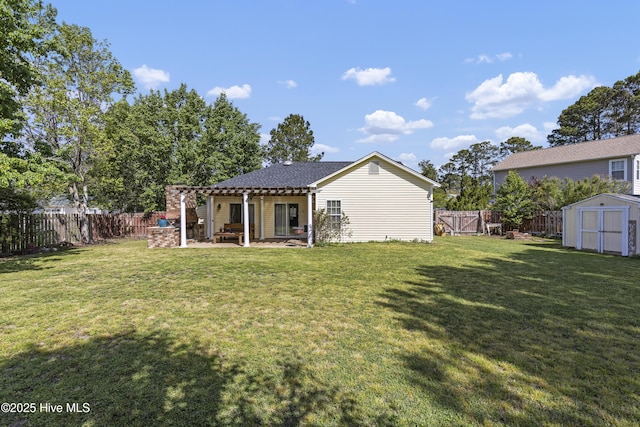 604 Lanvale Hills Cir, Leland, NC 28451 - back of property with a storage unit, a fenced backyard, a pergola, a patio area, and an outdoor structure