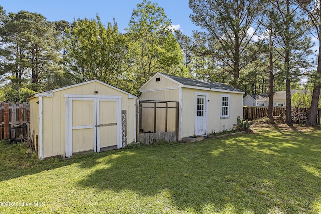 604 Lanvale Hills Cir, Leland, NC 28451 - view of shed with a fenced backyard