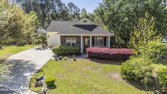 604 Lanvale Hills Cir, Leland, NC 28451 - view of front of property featuring an attached garage, driveway, roof with shingles, and a front lawn