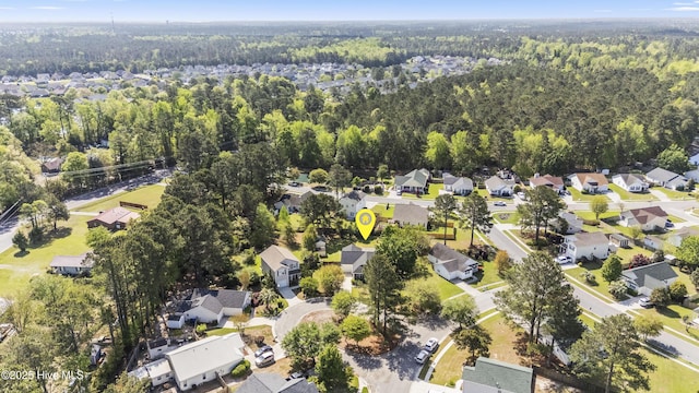 604 Lanvale Hills Cir, Leland, NC 28451 - drone / aerial view featuring a residential view and a wooded view