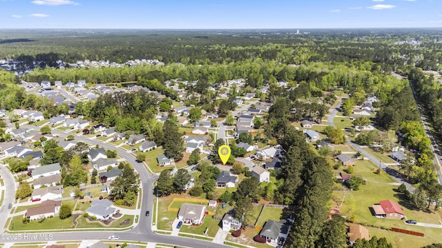 604 Lanvale Hills Cir, Leland, NC 28451 - bird's eye view featuring a forest view and a residential view