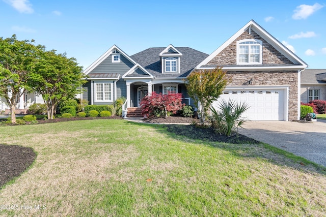 3675 W Medinah Ave, Southport, NC 28461 - craftsman inspired home featuring a standing seam roof, driveway, a front yard, a garage, and stone siding