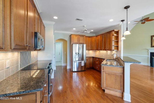 3675 W Medinah Ave, Southport, NC 28461 - kitchen with a sink, a ceiling fan, open shelves, and appliances with stainless steel finishes