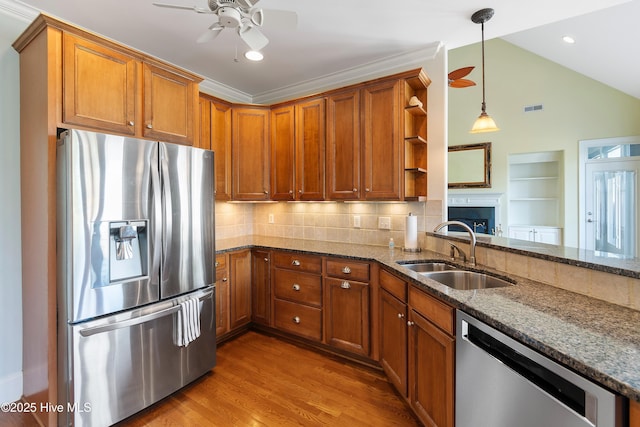3675 W Medinah Ave, Southport, NC 28461 - kitchen with ceiling fan, open shelves, a sink, dark stone countertops, and stainless steel appliances