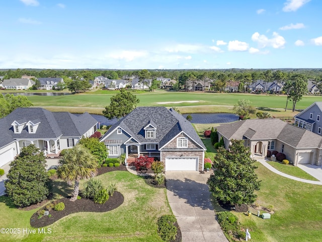 3675 W Medinah Ave, Southport, NC 28461 - birds eye view of property featuring a water view, view of golf course, and a residential view
