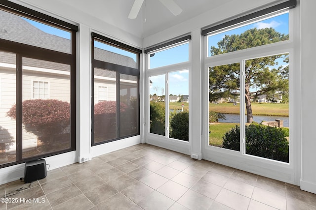 3675 W Medinah Ave, Southport, NC 28461 - unfurnished sunroom with a water view and tile patterned floors
