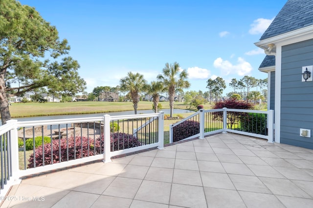 3675 W Medinah Ave, Southport, NC 28461 - view of patio featuring a water view and a balcony