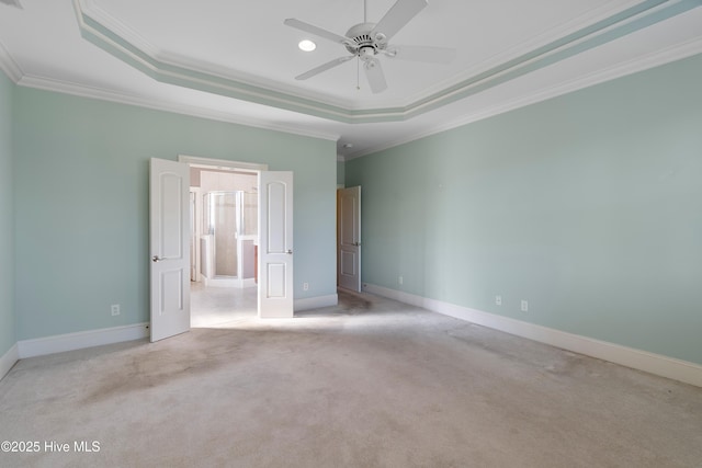 3675 W Medinah Ave, Southport, NC 28461 - unfurnished bedroom featuring crown molding, carpet floors, baseboards, and a tray ceiling