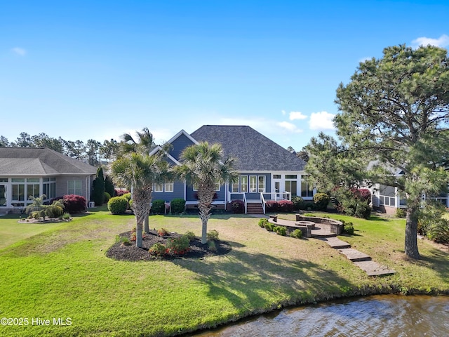 3675 W Medinah Ave, Southport, NC 28461 - view of front of house featuring a front yard