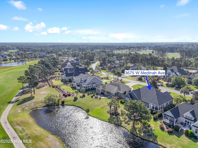 3675 W Medinah Ave, Southport, NC 28461 - birds eye view of property featuring a water view, view of golf course, and a residential view