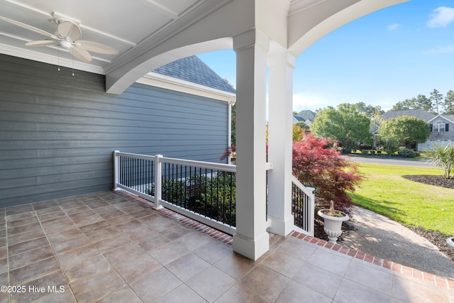3675 W Medinah Ave, Southport, NC 28461 - view of patio / terrace with a ceiling fan and covered porch
