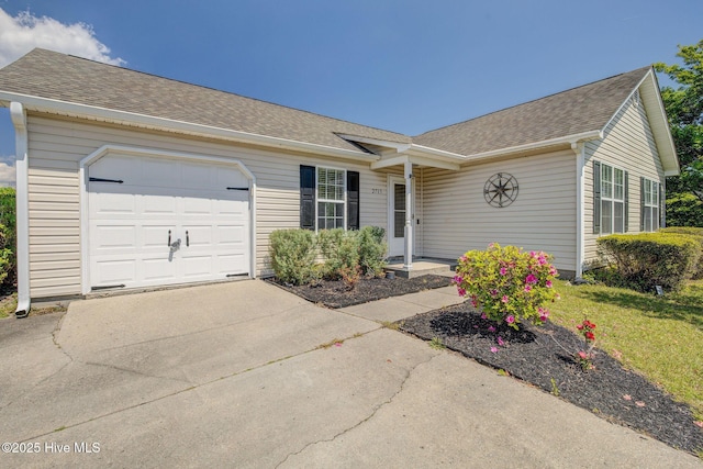 2715 Ashby Dr, Wilmington, NC 28411 - single story home with driveway, a shingled roof, and a garage