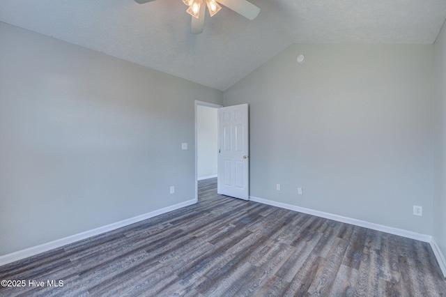 2715 Ashby Dr, Wilmington, NC 28411 - empty room with vaulted ceiling, baseboards, dark wood-type flooring, and ceiling fan
