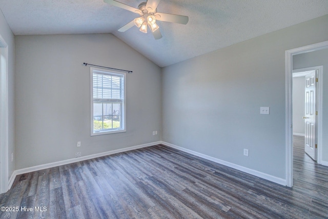 2715 Ashby Dr, Wilmington, NC 28411 - spare room with a ceiling fan, a textured ceiling, dark wood finished floors, baseboards, and lofted ceiling