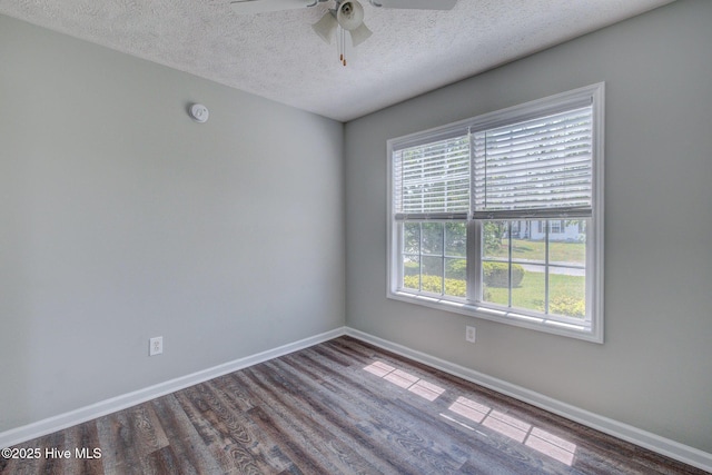 2715 Ashby Dr, Wilmington, NC 28411 - spare room with wood finished floors, a wealth of natural light, baseboards, and ceiling fan