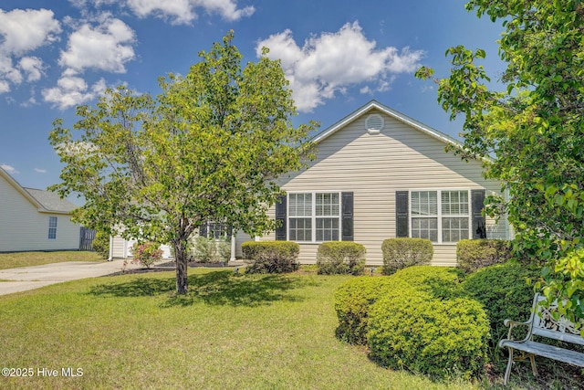 2715 Ashby Dr, Wilmington, NC 28411 - view of front of home with driveway and a front lawn