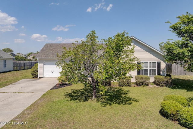 2715 Ashby Dr, Wilmington, NC 28411 - view of property hidden behind natural elements featuring a garage, driveway, a front yard, and fence