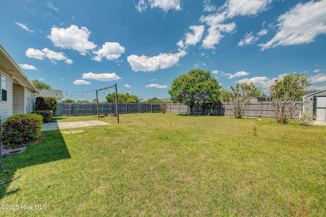 2715 Ashby Dr, Wilmington, NC 28411 - view of yard featuring a patio and a fenced backyard