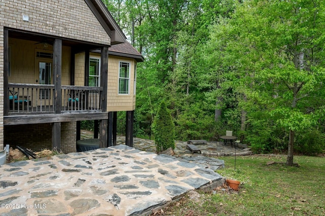 exterior space with outdoor dining space and a patio