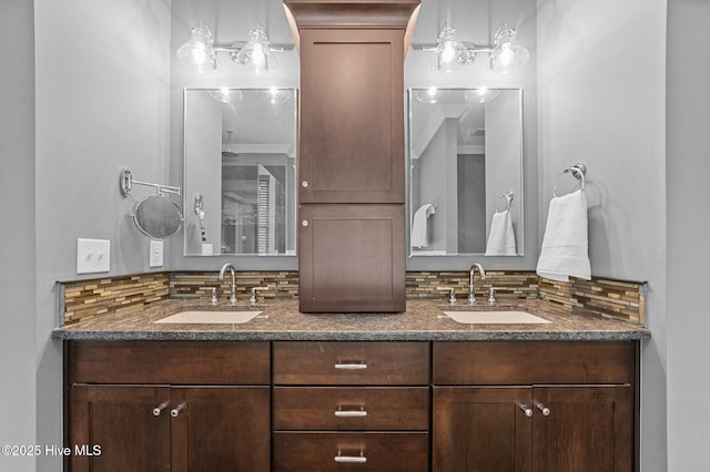 full bathroom with double vanity, a sink, and decorative backsplash