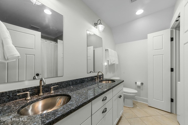 full bathroom with tile patterned flooring, visible vents, a sink, and toilet