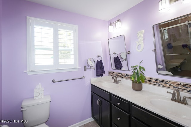 4238 Cherry Laurel Ln SE, Southport, NC 28461 - bathroom with double vanity, a shower stall, and tasteful backsplash