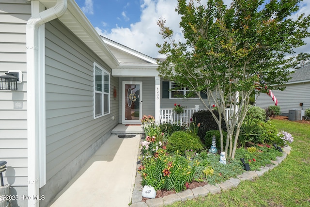 4238 Cherry Laurel Ln SE, Southport, NC 28461 - entrance to property featuring covered porch