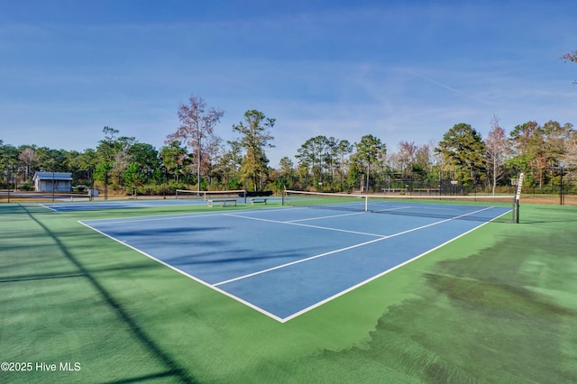 3722 White Cliffs Dr, Castle Hayne, NC 28429 - view of tennis court with community basketball court and view of wooded area