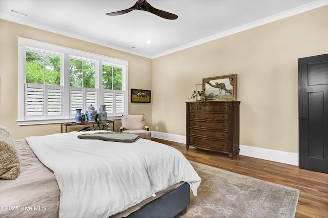 3722 White Cliffs Dr, Castle Hayne, NC 28429 - bedroom featuring crown molding, baseboards, wood finished floors, and ceiling fan