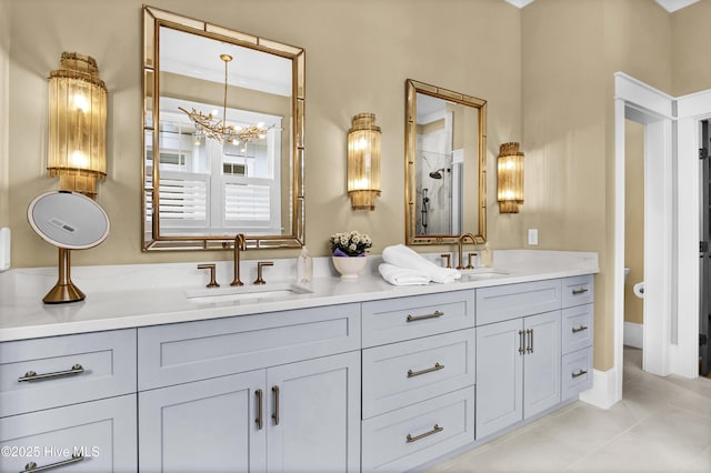 3722 White Cliffs Dr, Castle Hayne, NC 28429 - full bath featuring double vanity, a chandelier, tile patterned flooring, a shower, and toilet