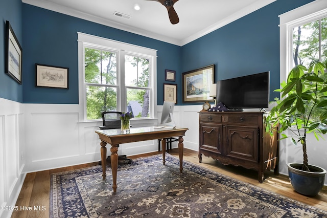 3722 White Cliffs Dr, Castle Hayne, NC 28429 - office space with ceiling fan, wainscoting, wood finished floors, a decorative wall, and crown molding