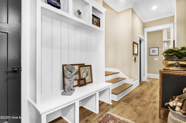 3722 White Cliffs Dr, Castle Hayne, NC 28429 - mudroom with light wood finished floors, ornamental molding, and baseboards