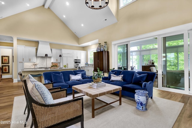 3722 White Cliffs Dr, Castle Hayne, NC 28429 - living room featuring high vaulted ceiling, beam ceiling, light wood-type flooring, and recessed lighting