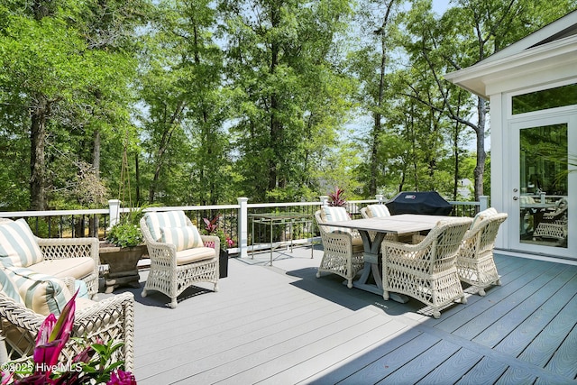 3722 White Cliffs Dr, Castle Hayne, NC 28429 - deck featuring outdoor dining space, a grill, and view of scattered trees
