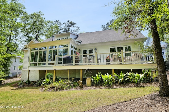 3722 White Cliffs Dr, Castle Hayne, NC 28429 - rear view of property featuring a wooden deck, a sunroom, and a yard