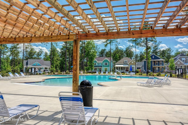 3722 White Cliffs Dr, Castle Hayne, NC 28429 - community pool featuring a pergola, a patio, and a residential view