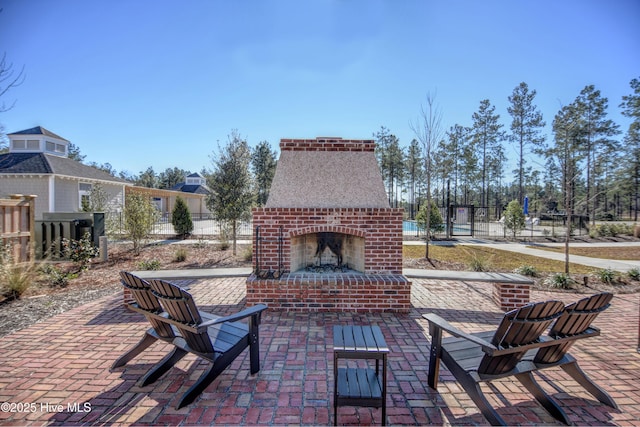 3722 White Cliffs Dr, Castle Hayne, NC 28429 - view of patio / terrace featuring an outdoor brick fireplace
