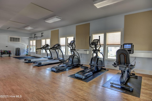 3722 White Cliffs Dr, Castle Hayne, NC 28429 - workout area featuring wood finished floors and baseboards