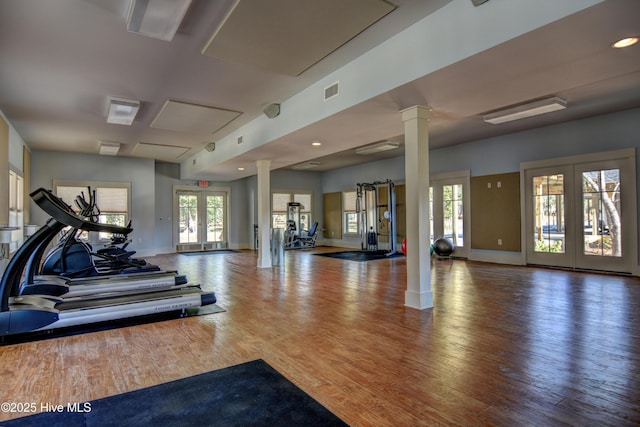 3722 White Cliffs Dr, Castle Hayne, NC 28429 - workout area featuring decorative columns, french doors, wood finished floors, healthy amount of natural light, and recessed lighting