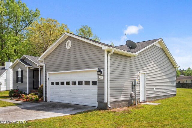 view of property exterior featuring an attached garage, a shingled roof, a yard, and concrete driveway