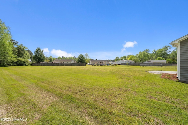 view of yard featuring fence