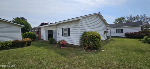 101 Oakland Blvd, Clinton, NC 28328 - rear view of house featuring a yard and an outdoor structure