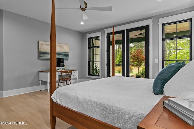 bedroom with baseboards, recessed lighting, access to exterior, and light wood-type flooring