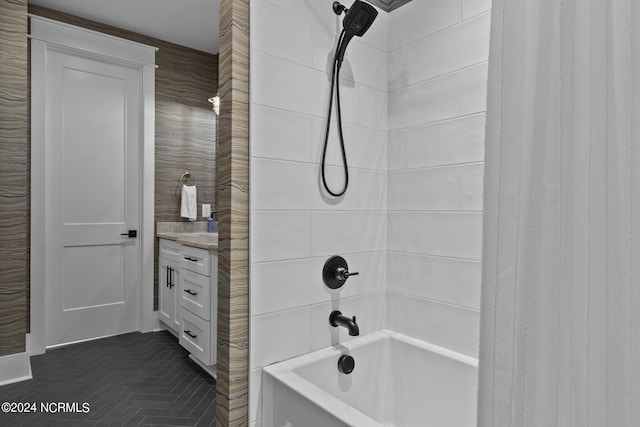 full bathroom with vanity and bathtub / shower combination