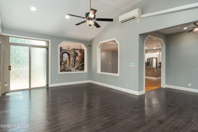 6321 Albatross Dr, New Bern, NC 28560 - unfurnished room with a wall unit AC, a ceiling fan, vaulted ceiling, dark wood-type flooring, and baseboards