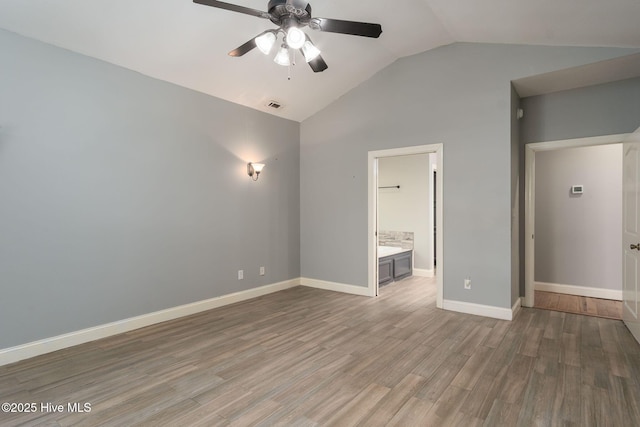 6321 Albatross Dr, New Bern, NC 28560 - empty room with ceiling fan, lofted ceiling, wood finished floors, and baseboards